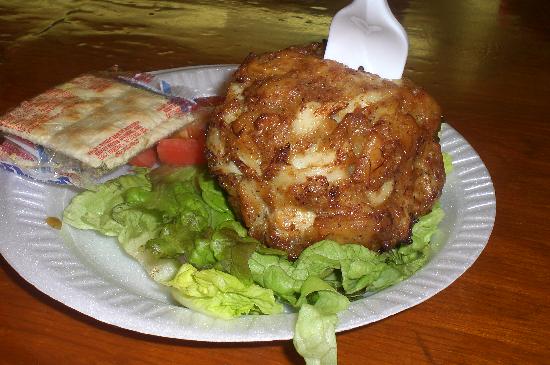 Faidley's Seafood signature dishes Jumbo Lump Crab Cakes, Raw Oysters, Fried Fish.